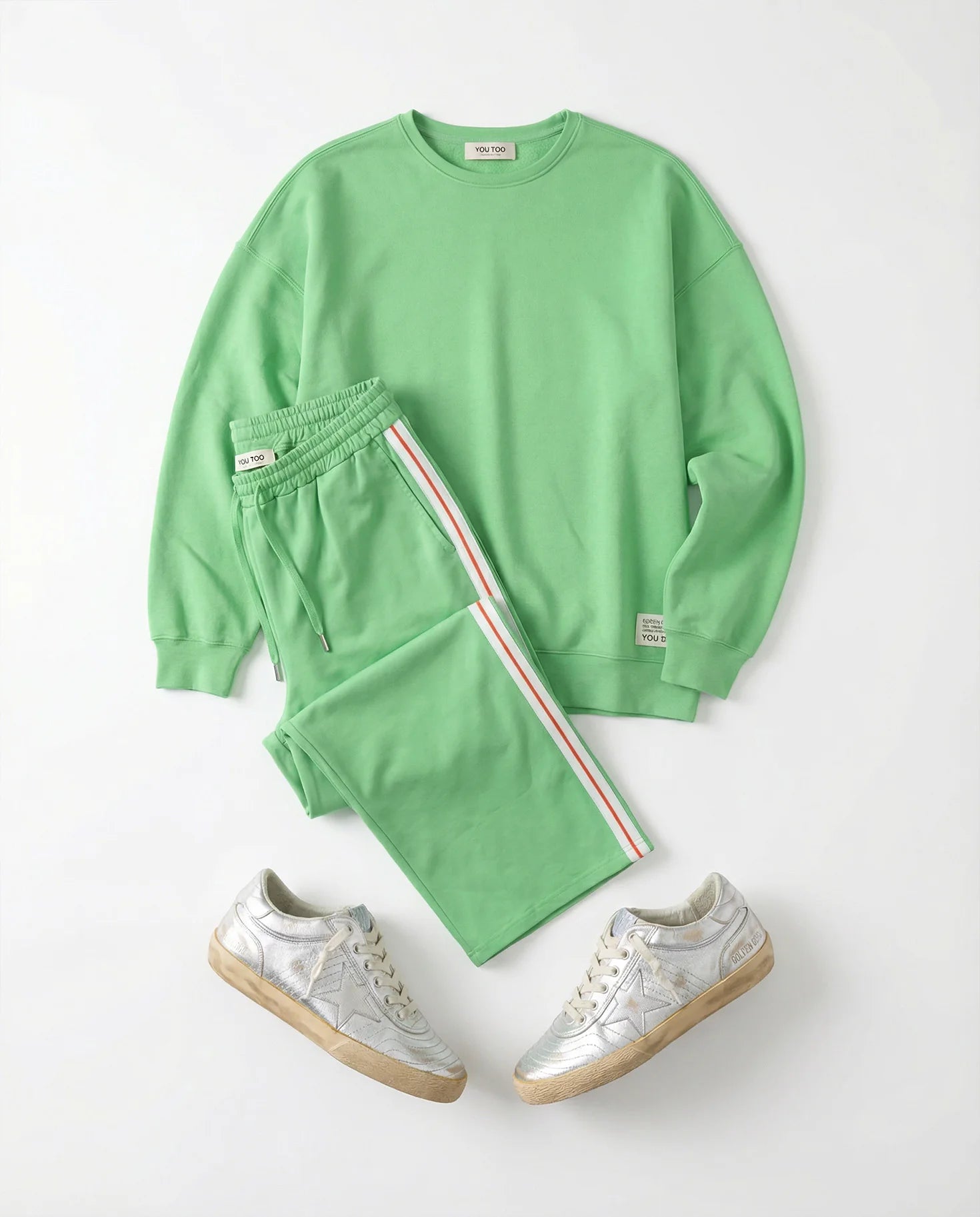 Produktbild Jogginghose grün gefaltet mit passendem Sweatshirt Frontansicht #farbe_fresh green