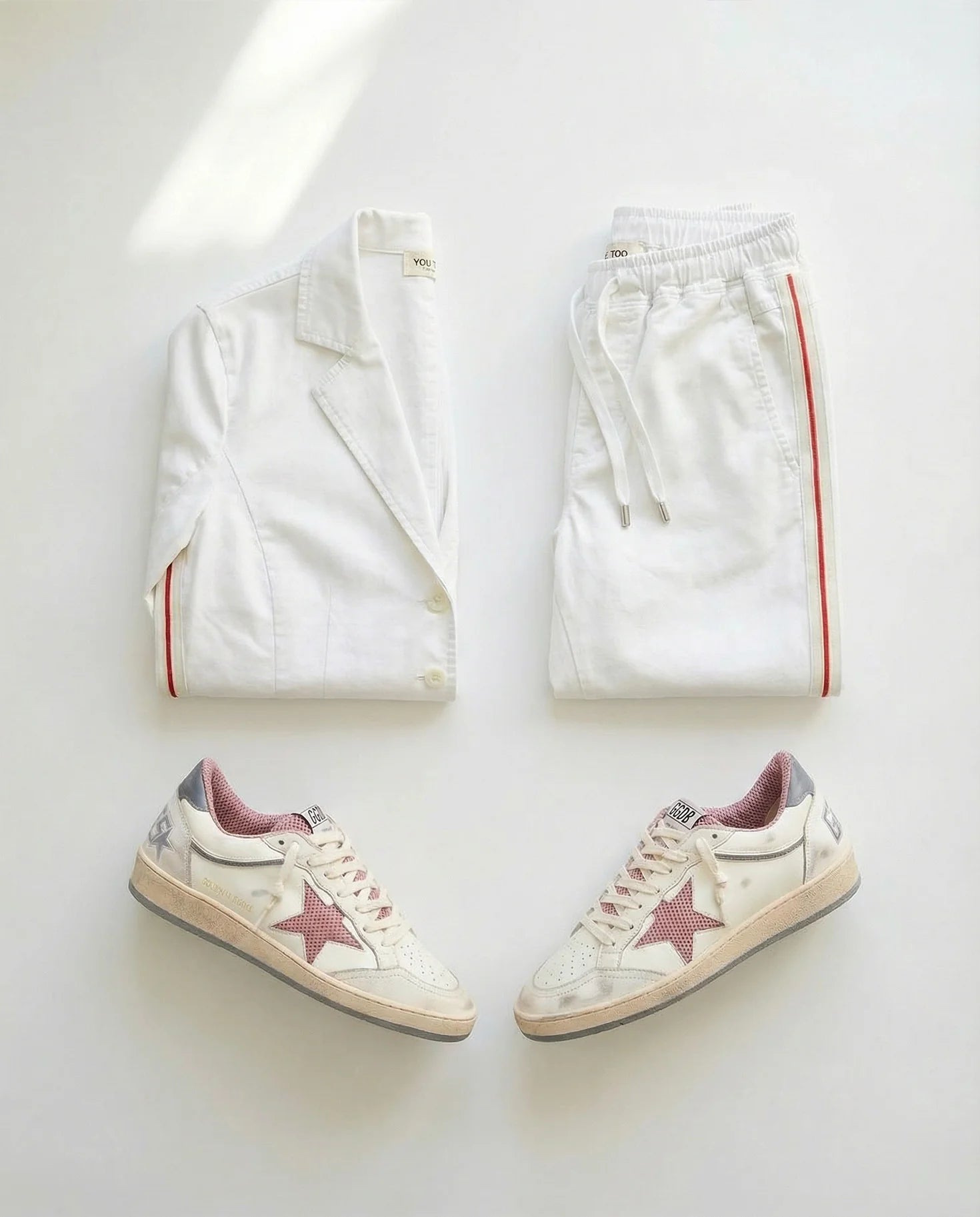 Produktbild gefalteter Blazer weiß und passende Hose gefaltet #farbe_white stripe